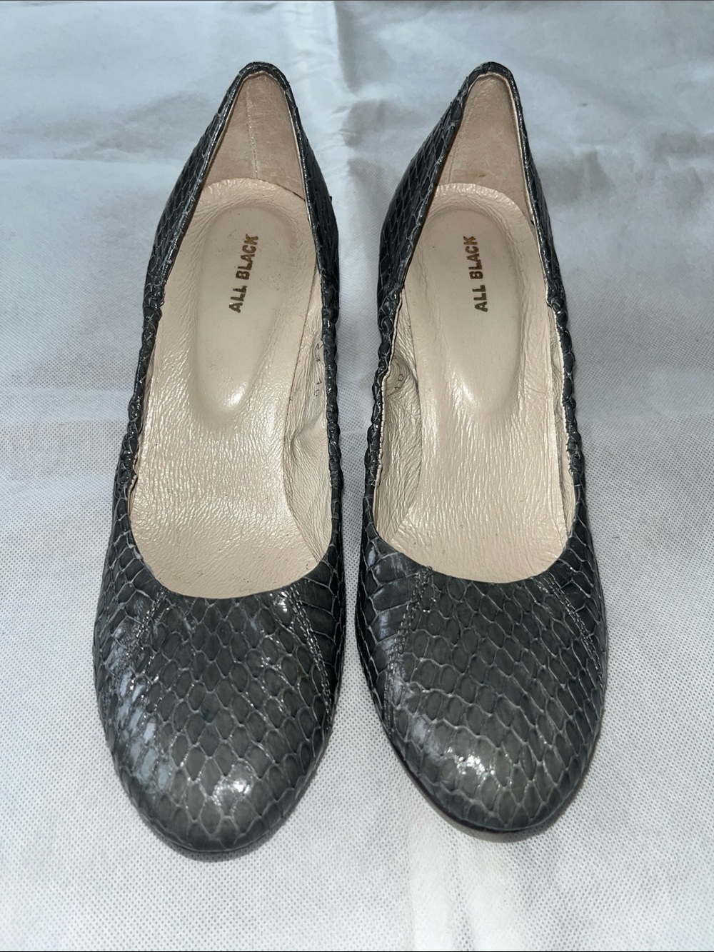 All black: leather snake print heels